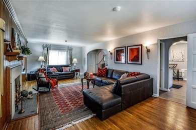 Note the beautiful hardwoods and spacious living r
