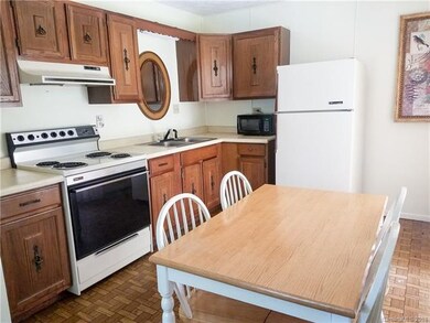 Downstairs Kitchen in Large White Home 5BR/3BA