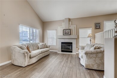 Fireplace keeps this expansive room feeling cozy a