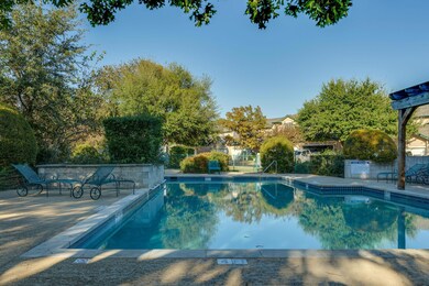 Community pool with a patio area