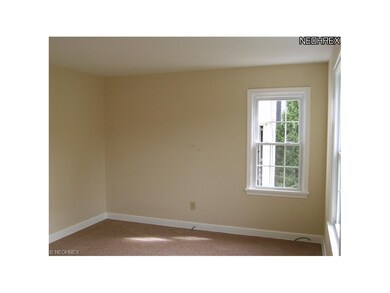 nice neutral living room 14x20 with newer windows