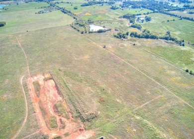 Bird's eye view featuring view of desert and a rural view