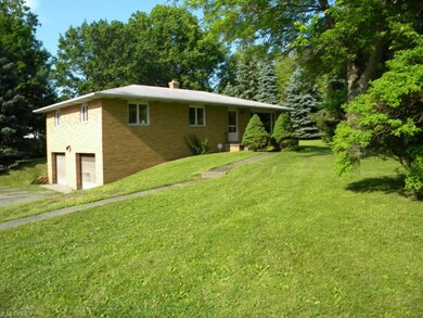 Enjoy this one-owner gem on a beautiful lot with m