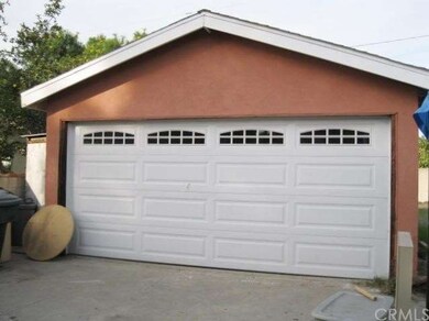 2 Car Detached garage with storage cabinets