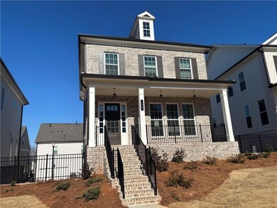 Add some rockers or an outdoor bench to create an inviting atmosphere on your covered front porch. Photo of previously built Greenville floorplan.