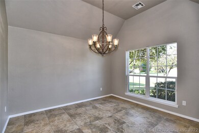 Beautiful Chandelier and Tiled Floor.