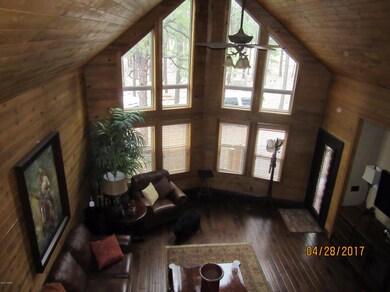 Great room with a wall of windows