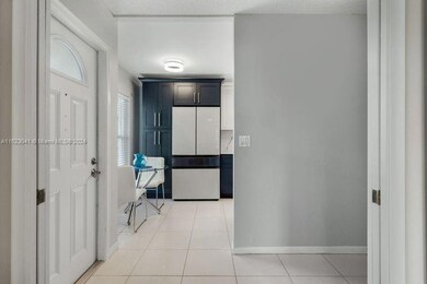 Front Door & Kitchen