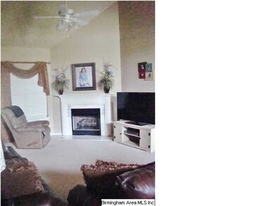 Great room has vaulted ceiling