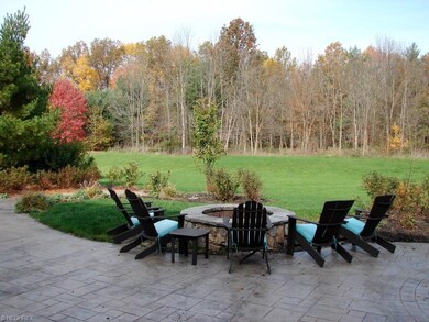 huge stamped patio with extra large fire pit