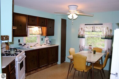 5794 Prescott Dr, Tawas City, MI 48763 - photo 2