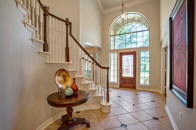 The large 2-story entry has ample space to welcome