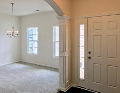 Foyer with Arched Entryways