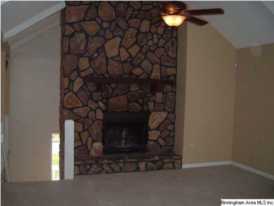 Great Room with stone fireplace.
