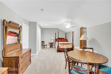 Upper level bedroom with bonus area
