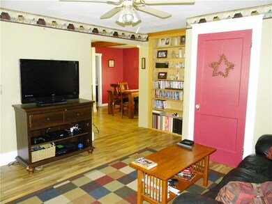 Connects Kitchen, Dining room, and Front