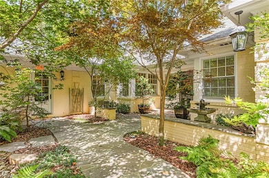 Peace and tranquility is what you and your guests will feel when approaching the entrance of this beautiful lake-front home.