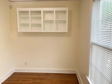 8x12 dining room with open shelving and newly refi