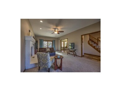 Living Room looking into Dining Room, Backyard and