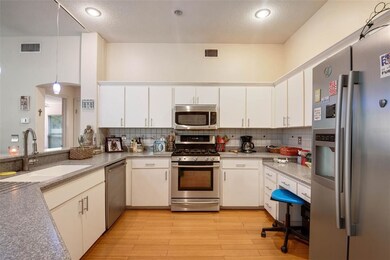 You will love the gas range and amount of cabinets