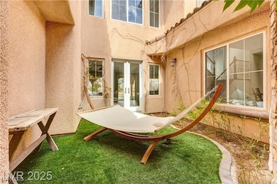 View of patio featuring french doors