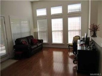 Gathering room tons of natural light open to kitch