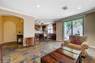 Family Room with slidders to Paved Patio