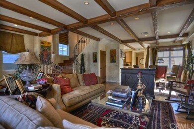 Living/Dining great room is enhanced by custom woo