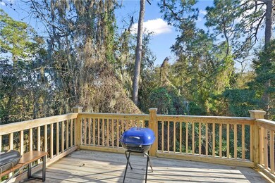 Second floor rear deck with great view.