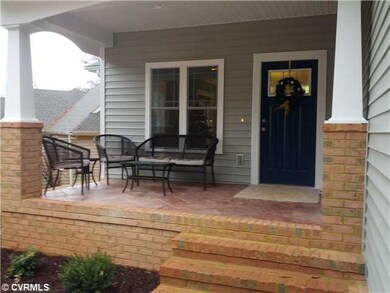 Exterior Front - Stamped, stained concrete with bl