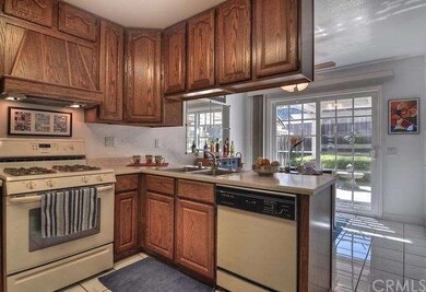 Open kitchen with Maytag appliances.