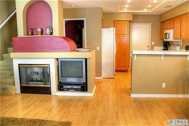 The living room and kitchen
