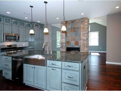 Kitchen. Spacious kitchen island  and stone/slate 