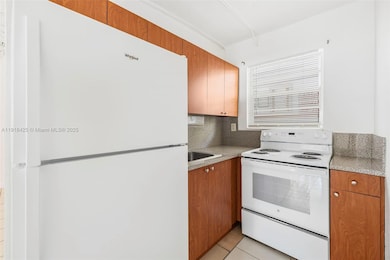 5730 NW 38th St unit 11, Virginia Gardens, FL 33166 - photo 2