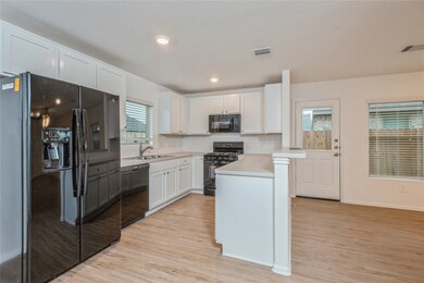 223 Alder Laurels Cove, Magnolia, TX 77354 - photo 4