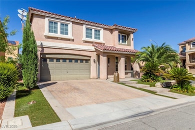 Mediterranean / spanish house featuring stucco siding, decorative driveway, an attached garage, a tile roof, and a porch