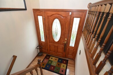 You are greeted with a beautiful leaded glass fron