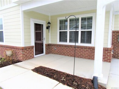 Covered Front Porch measuring 12x7 with Outdoor Li