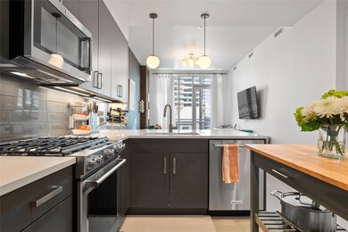 Kitchen featuring a sink, tasteful backsplash, ap