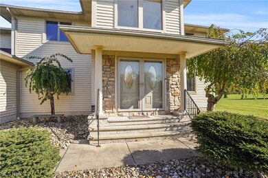 Property entrance with a yard