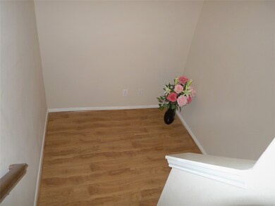 Big space at the stairs landing, room for bookcase