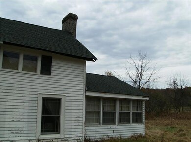 It has some wood rot around the edges of the eaves where the gutters used to be and on a few corners...other than that the poplar siding seems  to have weathered well.