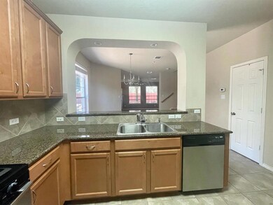 Kitchen with appliances with stainless steel fini