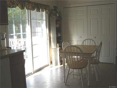Sliding Doors lead out to deck.