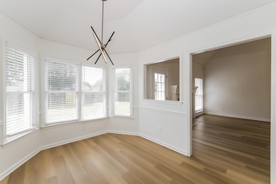 Unfurnished dining area featuring light wood-type 