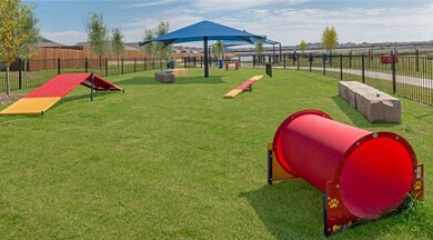 View of jungle gym with a yard
