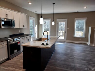 Kitchen featuring stainless steel appliances, a ki