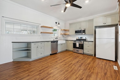 Huge kitchen with almost full remodel! New appliances, new flooring, new windows & light fixures!