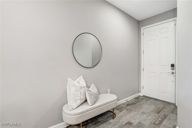 Entryway featuring light wood-style flooring and b