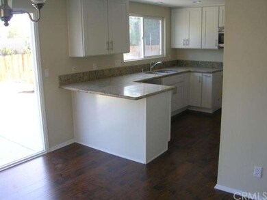 Granite Counters, new cabinets beautiful wood floo